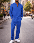 Conjunto de hombre compuesto por sudadera de punto gofre y pantalón recto.