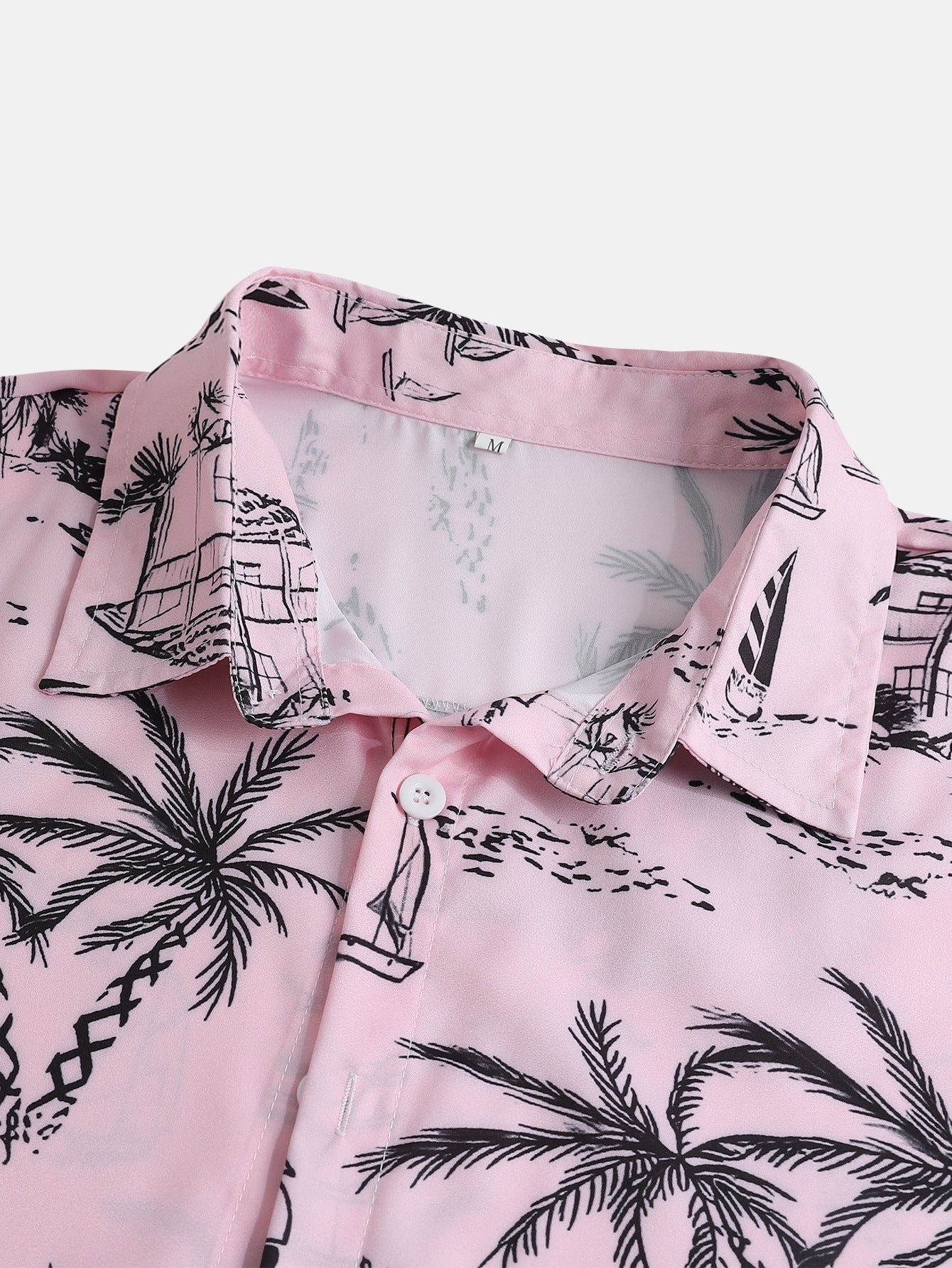 Camisa de botón con estampado de velero de palmera y pantalones cortos de baño