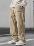 Pantalón de hombre , con cordón y bolsillos.
