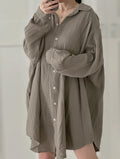 Blusa de muselina, larga, oversize, gris pardo.